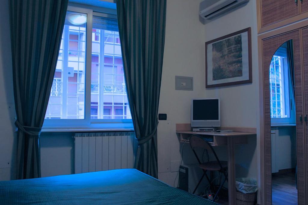 Aparthotel Tourist House Roma Pokoj fotografie